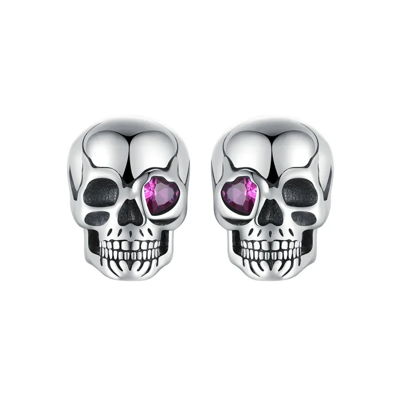 Boucles d'oreilles tête de mort en argent sterling 925 avec un oeil rose en forme de coeur